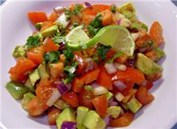 Avocado, tomatoes, and cucumbers with a hint of lemon